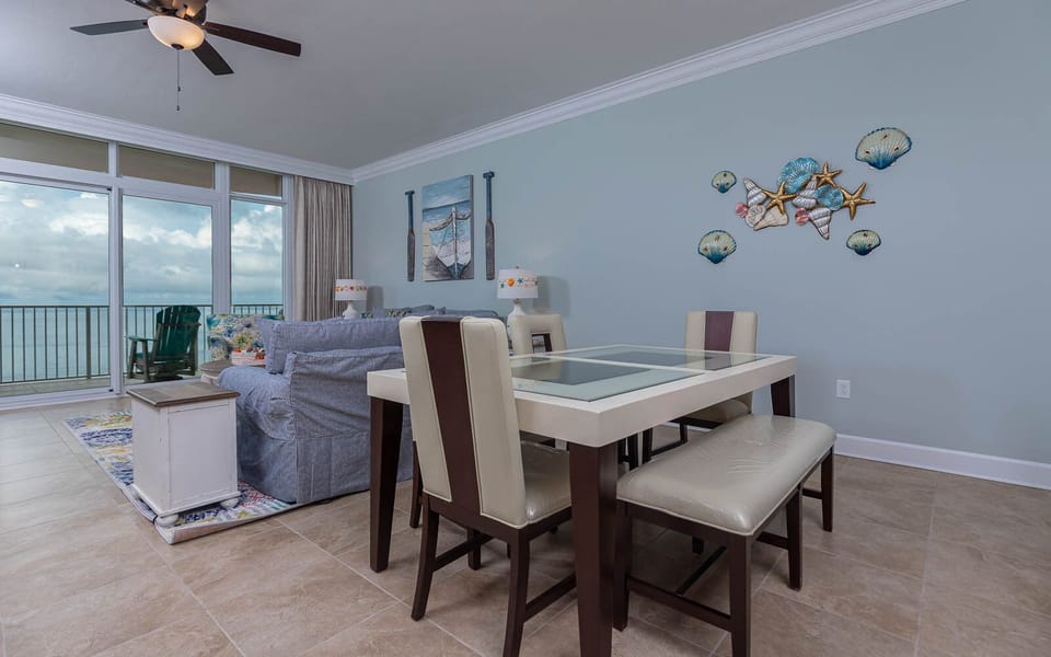 Sink into the sofa with queen sleeper and enjoy gulf views through sliding glass doors