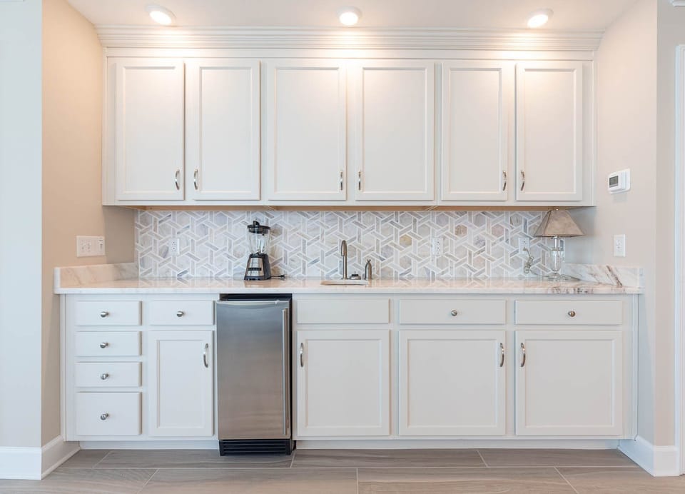 Fetch chilled drinks from the stainless mini-fridge and blend a smoothie at the wet bar