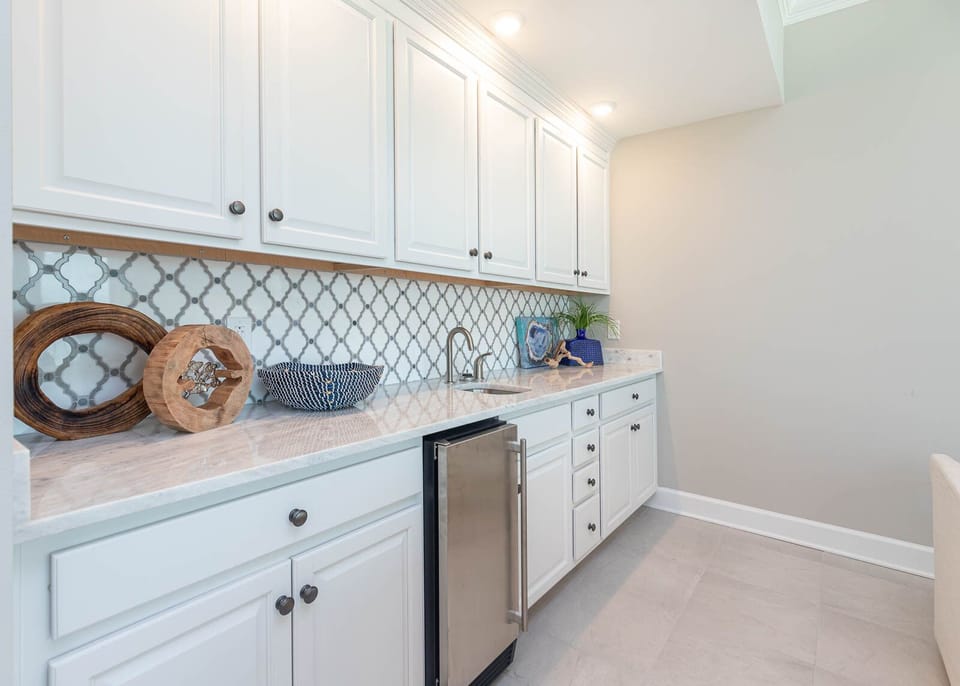 Grab a chilled drink from the fridge or create your favorite cocktail at the wet bar