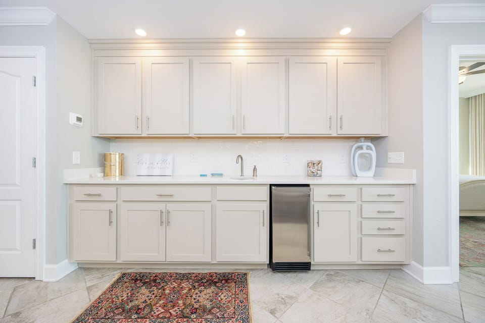 Grab a chilled drink from the fridge or create your favorite cocktail at the wet bar
