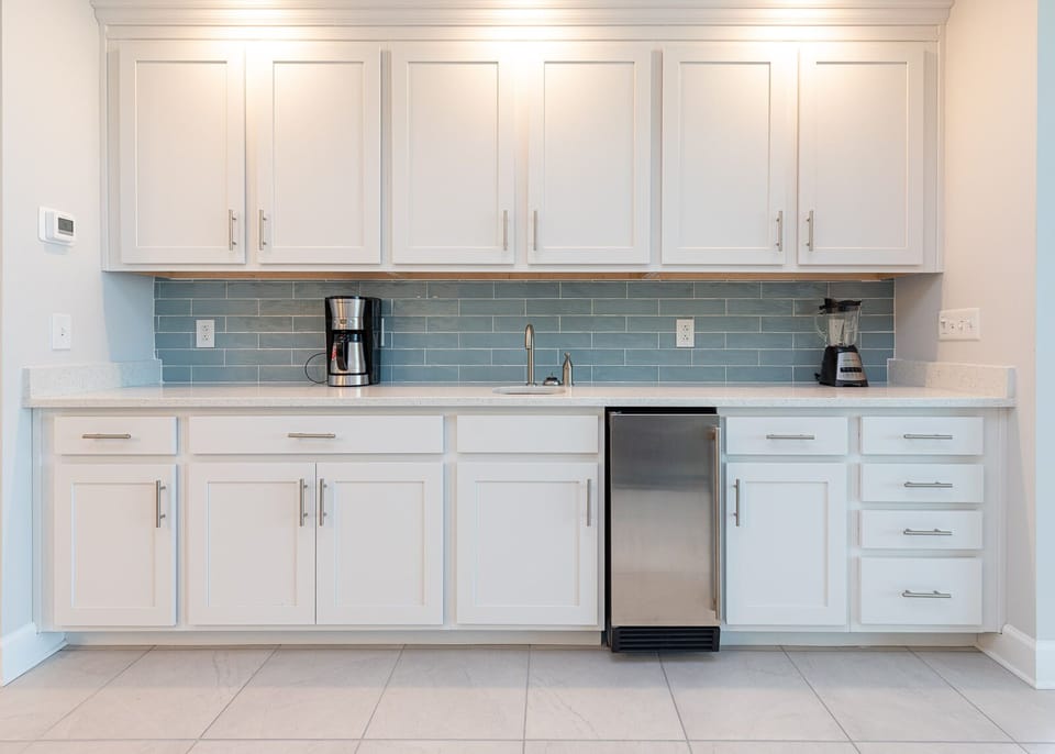 Blend smoothies at the wet bar and grab a chilled drink from the stainless mini fridge