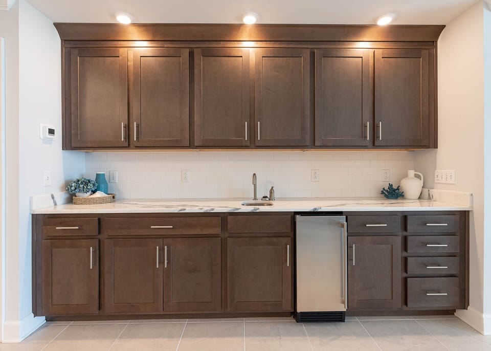 Grab a chilled drink from the fridge or create your favorite cocktail at the wet bar