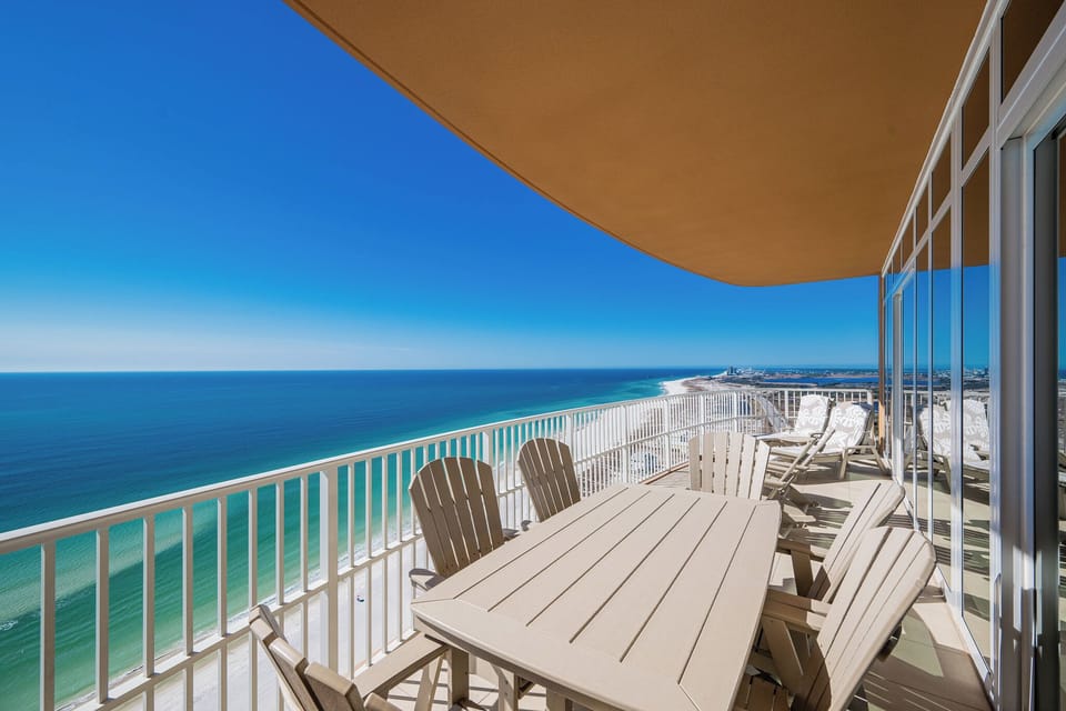 Experience seemingly endless coastline views from your corner balcony as waves lap the shore