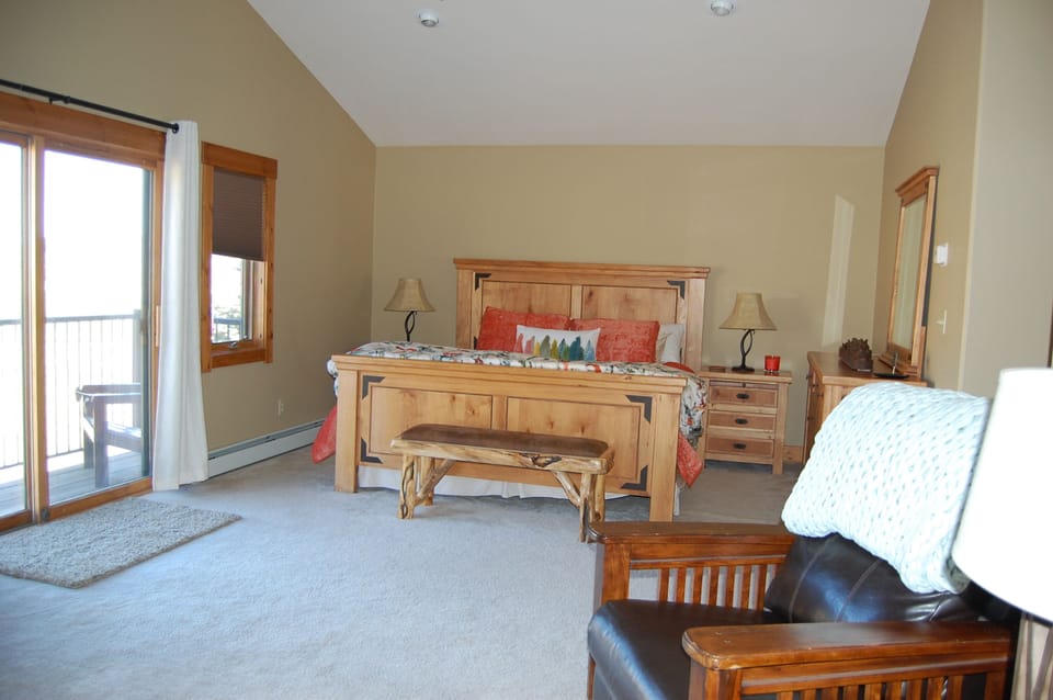 Large primary with sitting area and Smart TV plus private balcony