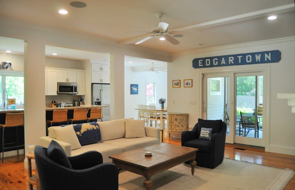 Open concept living area with screened in porch