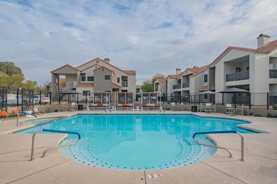 Pool #1. Dip into paradise: refreshing pool and cabanas.