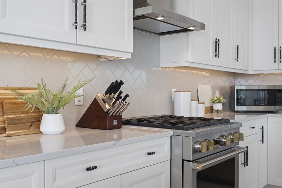 The kitchen is a Chef's haven, with GE Monogram gas stove.