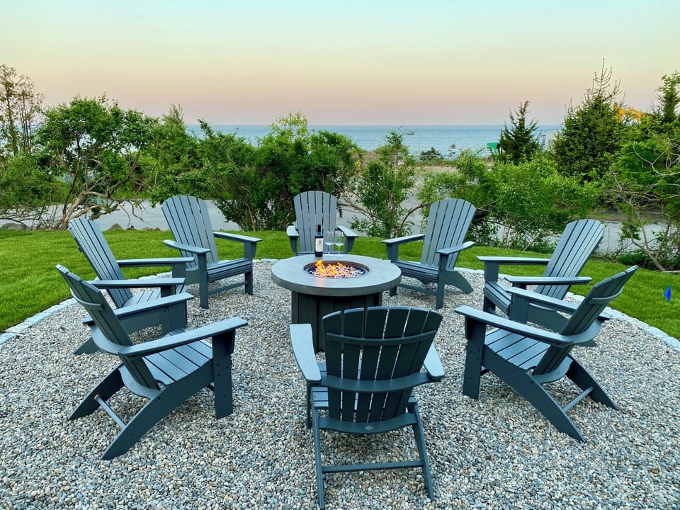 Propane firepit with Adirondack chairs and Ocean views!