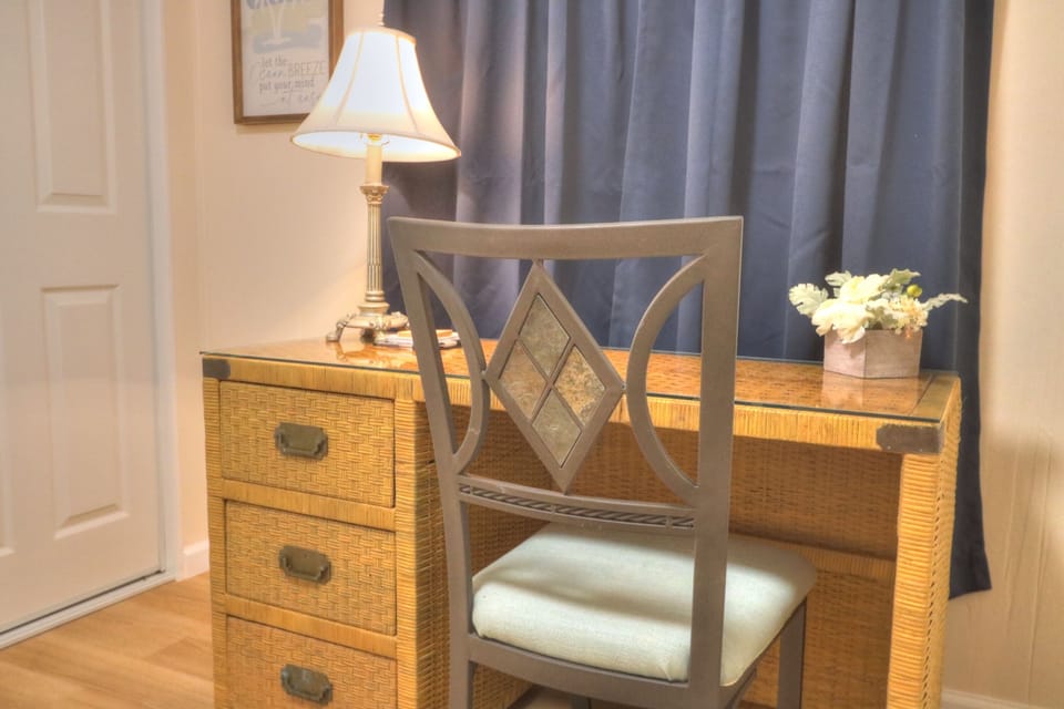Desk in bedroom #2 has basic supplies (stapler, paper clips, note pad, pen, tape