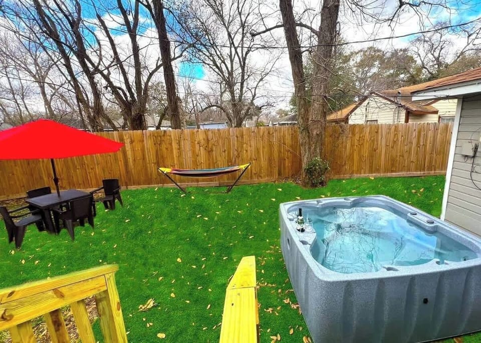 Relaxing Backyard Retreat with Hot Tub & Hammock