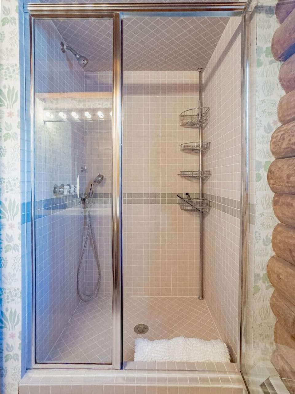 This bathroom includes a stand up shower