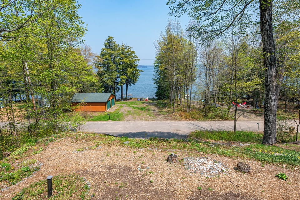 - Scenic lake view steps from the cabin’s tree lined path - Open outdoor space perfect for morning walks or photos - Nature filled setting offering calm and refreshing moments