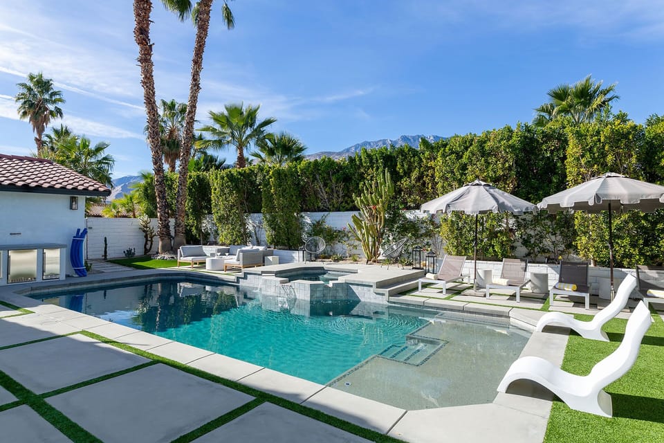 Pool, hot tub and lounging area