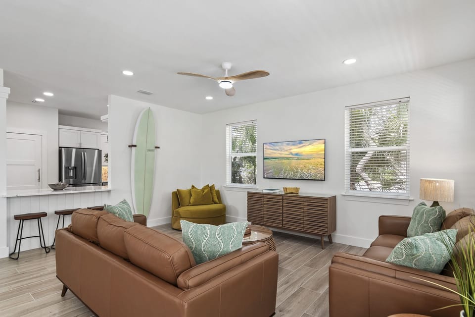 Living Room with plenty of comfortable seating and 55” Smart TV