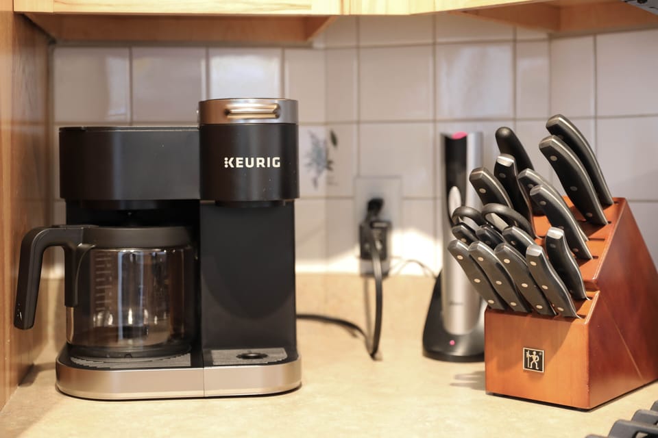 The kitchen has a combo drip coffee and Keurig pods 
