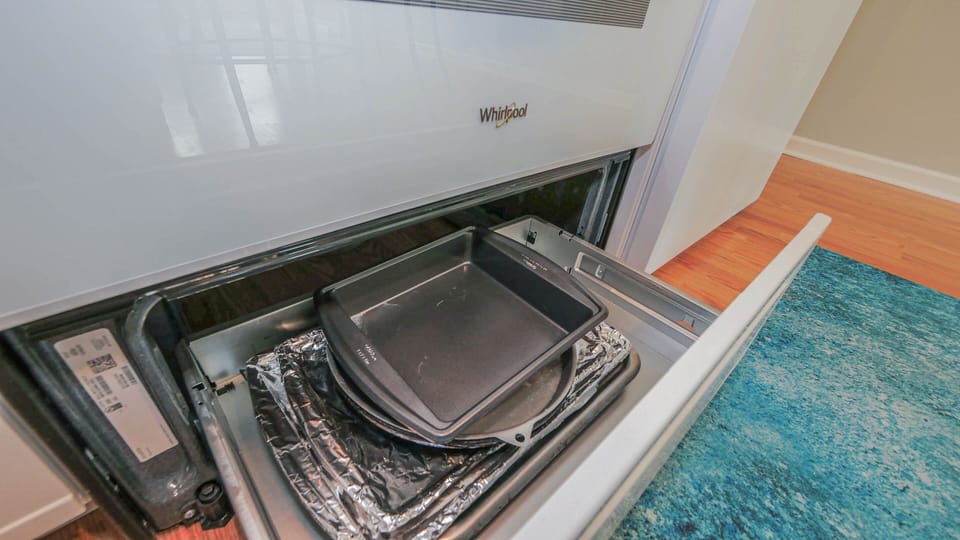 Cookie Sheets & Baking Pans are located in the Drawer Below the Oven