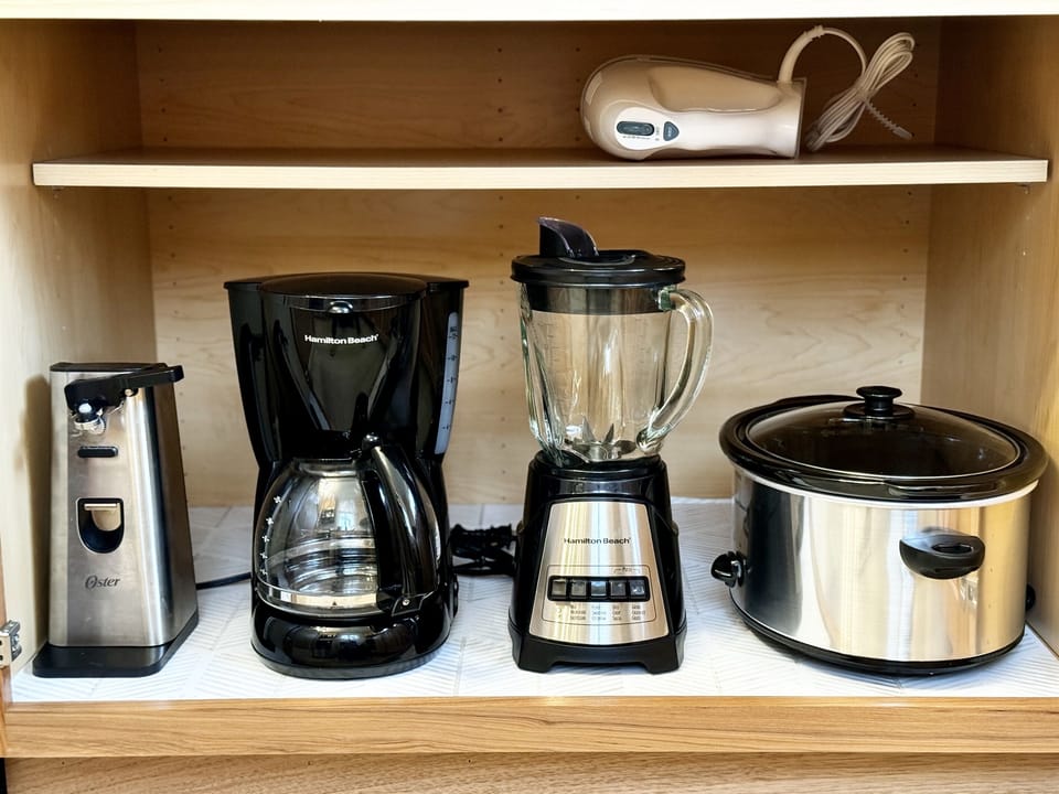 We include several small appliances so you can cook at the Farmhouse - crockpot, blender, coffee pot (full size and Keurig), hand mixer, small stand mixer, etc.