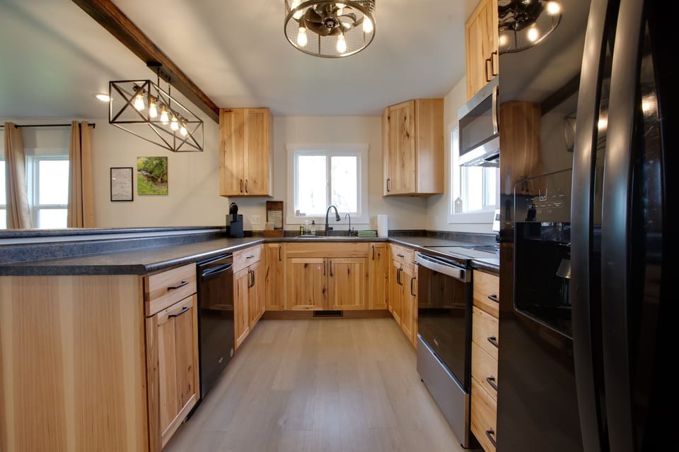 The kitchen includes a dishwasher and many common small kitchen appliances.