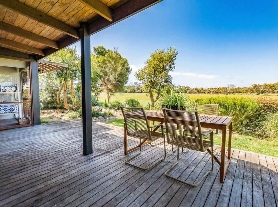 Outdoor back deck overlooking the farmland