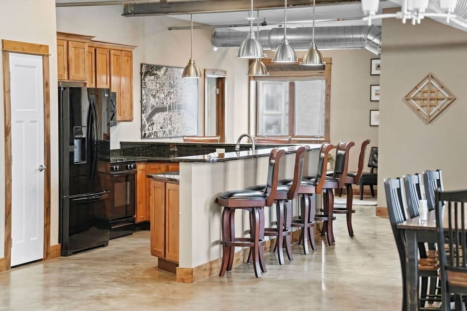 The kitchen with plenty of seating at the bar!