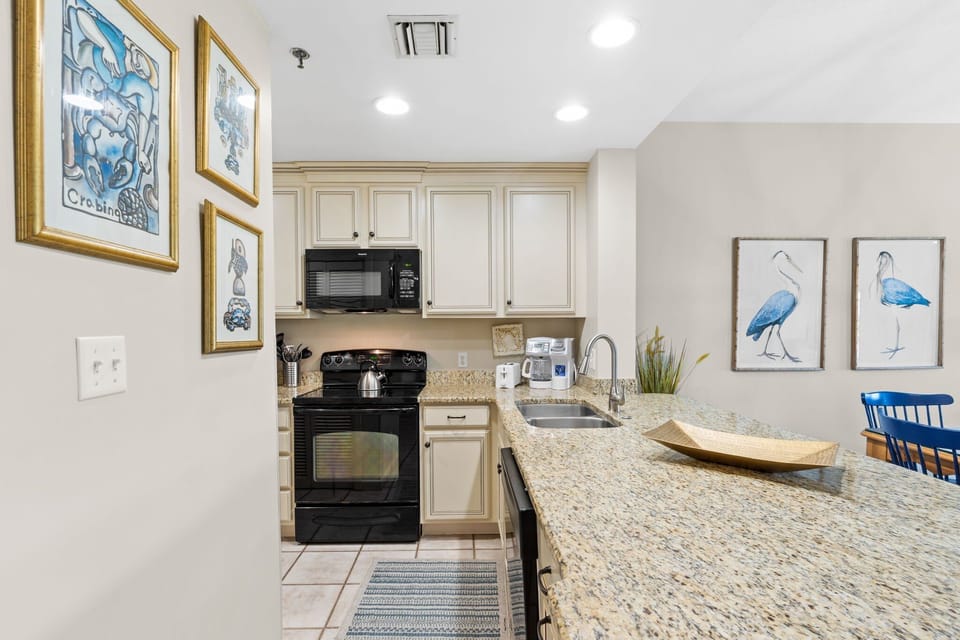 Enjoy this spacious and fully stocked kitchen that has everything.