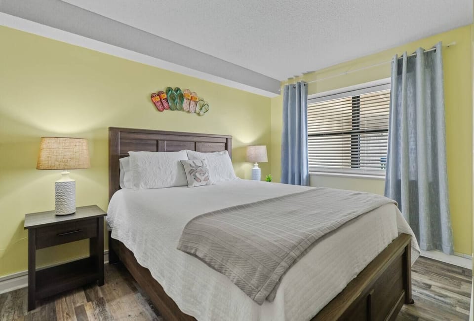Second bedroom has a queen bed with an attached bath
