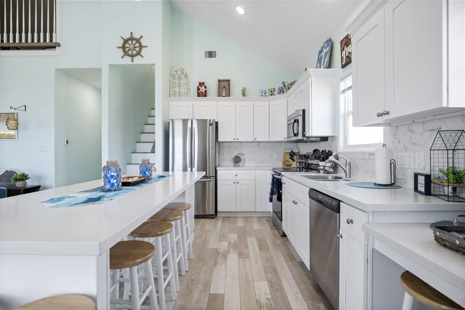 Kitchen doubles as a lovely gather space for meals. 
