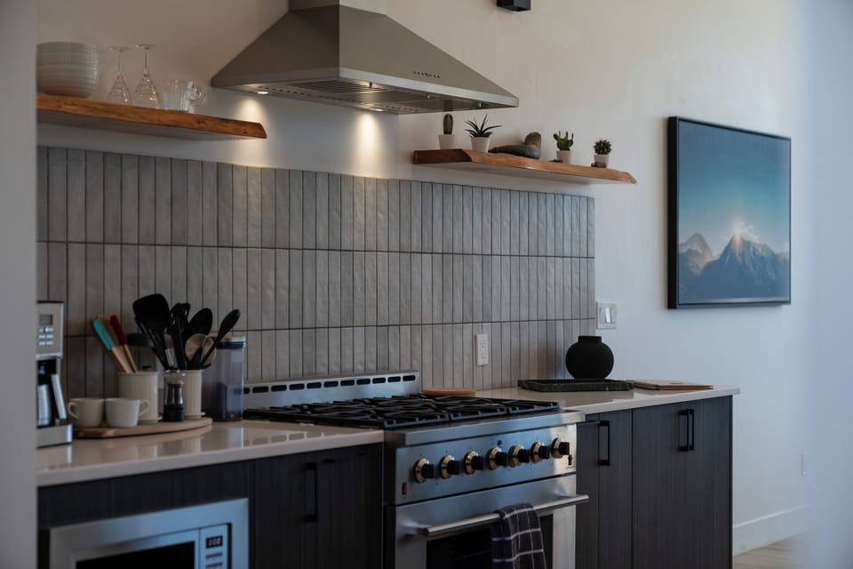 Fully stocked Kitchen with surrounding windows