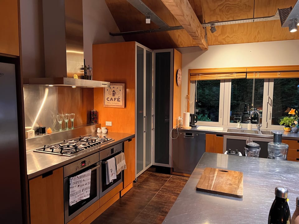 Gourmet Kitchen with Gas Burners and two electric stoves.