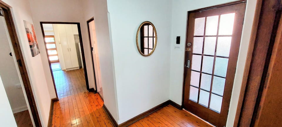 Entry Foyer looking down toward the kitchen and rear of the cottage