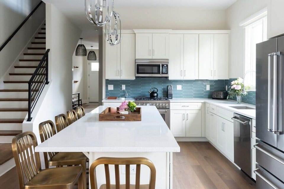 Taylor Haus I - Bring friends and family together at the kitchen bar and let laughter and stories flow freely.