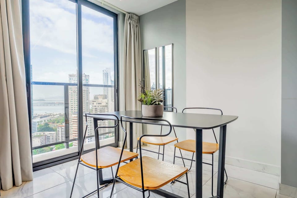 Dining nook with panoramic city views.