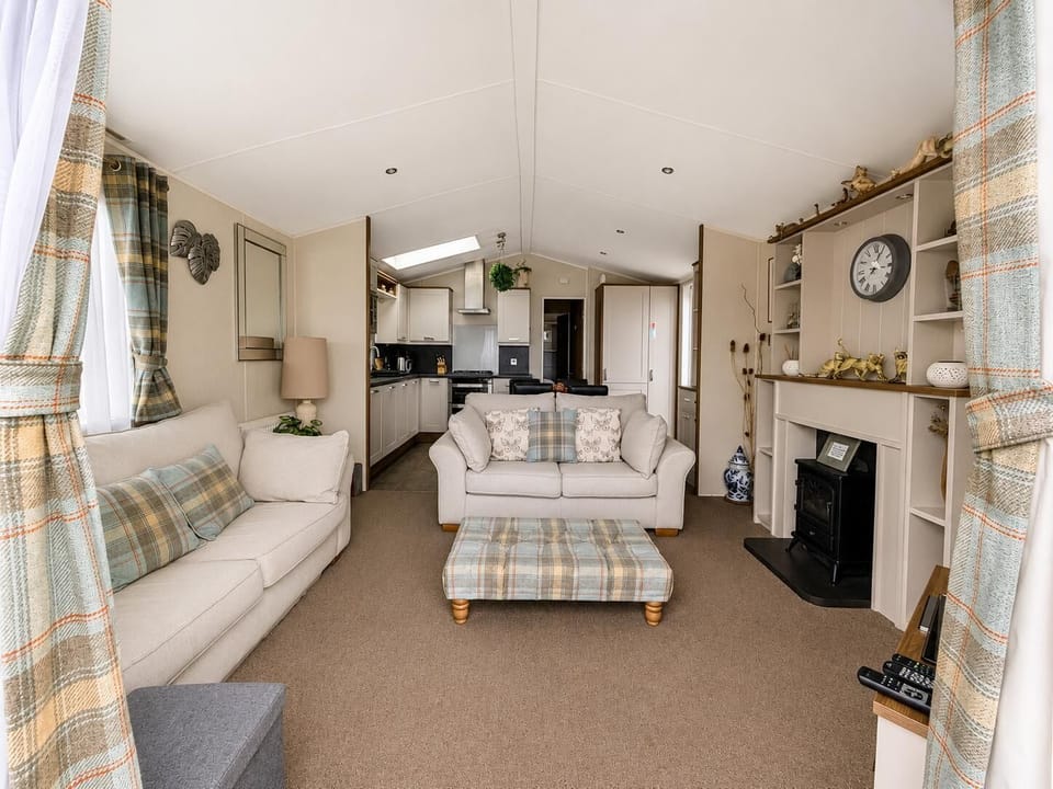 The caravan dining room offers a cosy space to enjoy home-cooked meals on your trip.