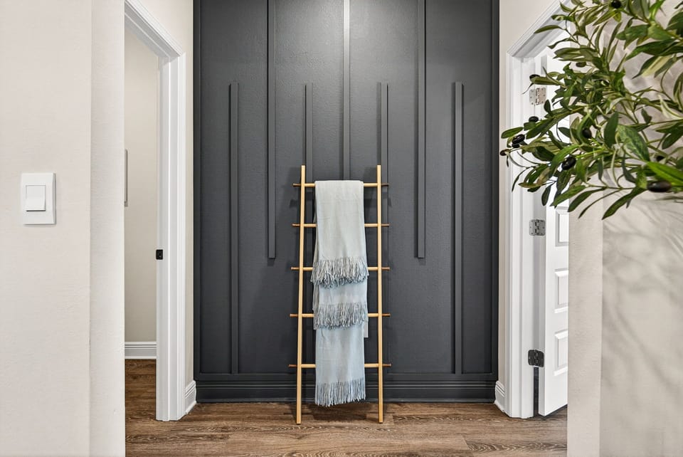 Enjoy a sophisticated home with sleek decor, where smart storage meets elegant design.