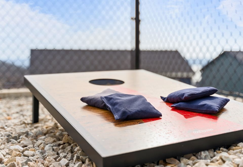 Cornhole fun is always a hit! Enjoy some friendly competition while soaking up the sun.