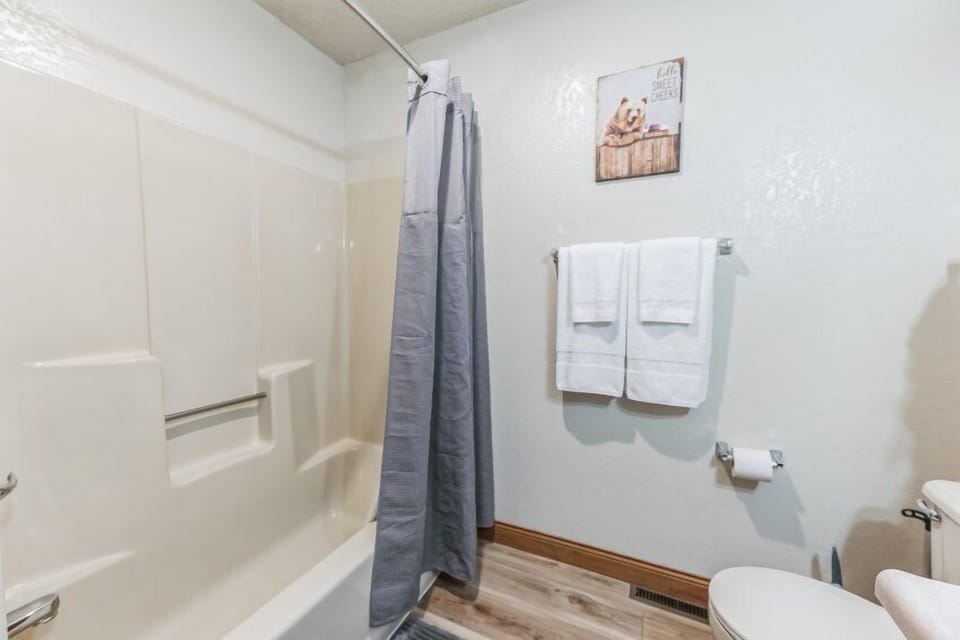 Indulge in moments of relaxation or invigoration in our modern tub and shower combo. Whether you're starting your day with an energizing rinse or ending with a soothing soak, this space offers a spa-like ambiance for your utmost comfort.