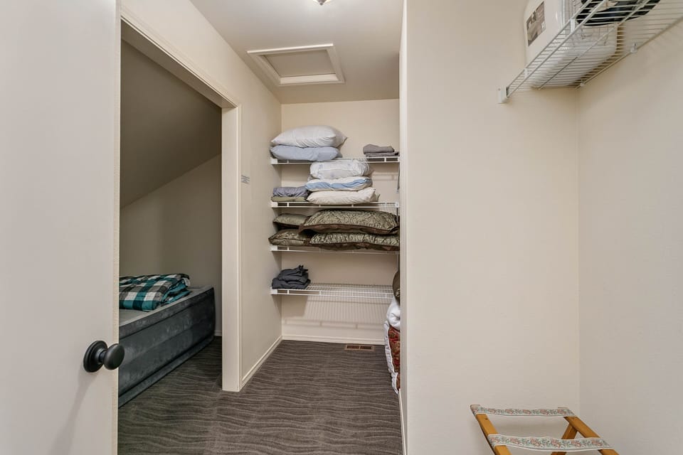 Big walk in closet upstairs attached to Master Bedroom.