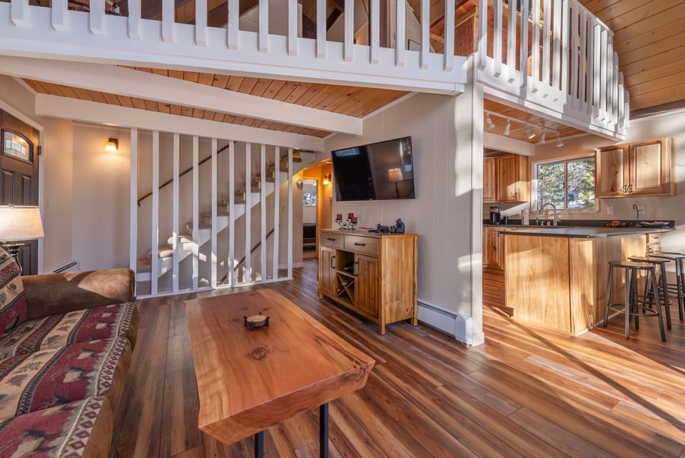 Living room includes new furniture and decor