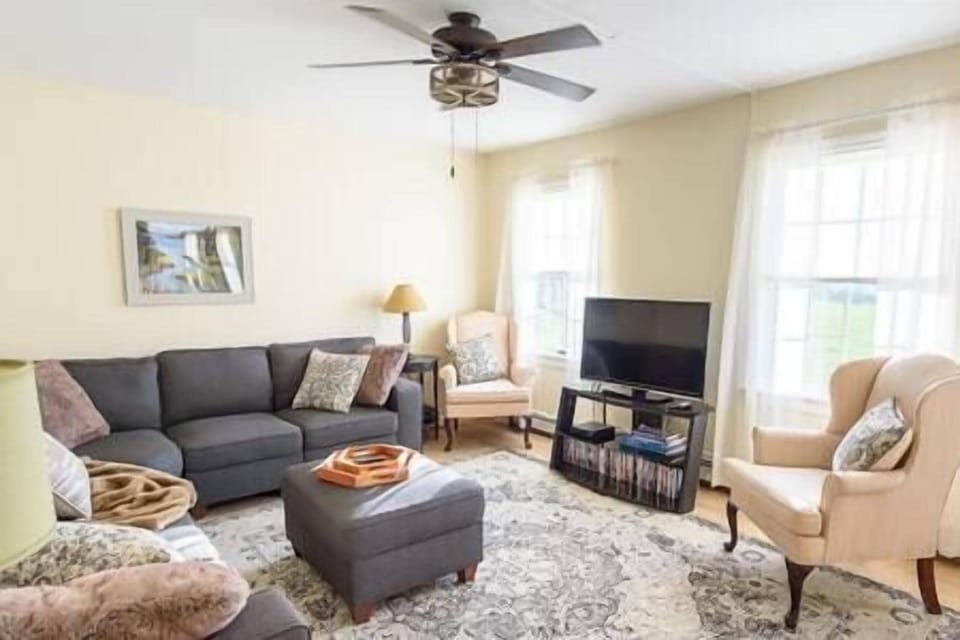 The large livingroom has seating for a minimum of 8 people. Streaming services are also available.