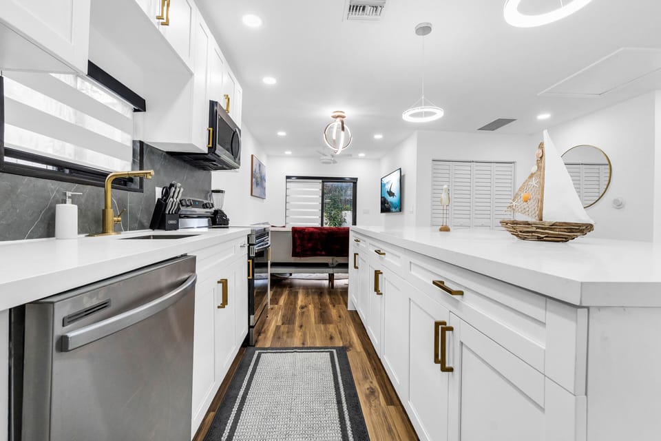 Fully remodeled kitchen with appliances, pots/pans, cooking utensils, etc