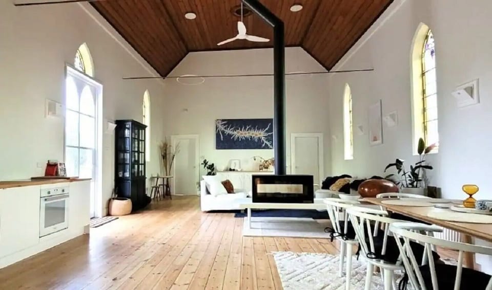 The spacious living, dining and kitchen in the main hall of the church