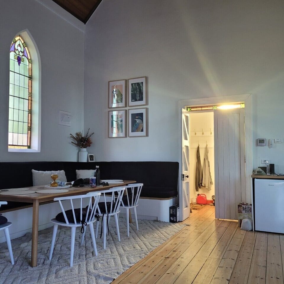 The generous banquette seating around the dining table