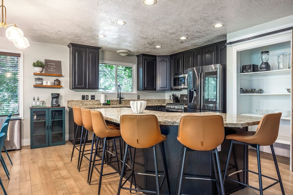 Our kitchen and dining area comes with plenty of seating to fit the entire group