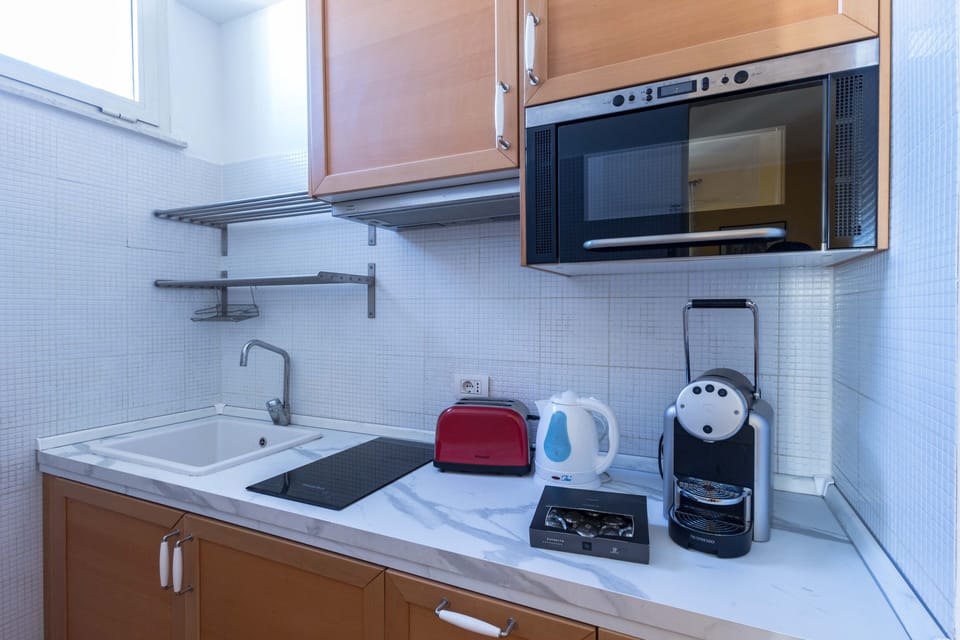Fully equipped kitchen (intuitions plates Nespresso, microwave oven, toaster, boiler and fridge)
