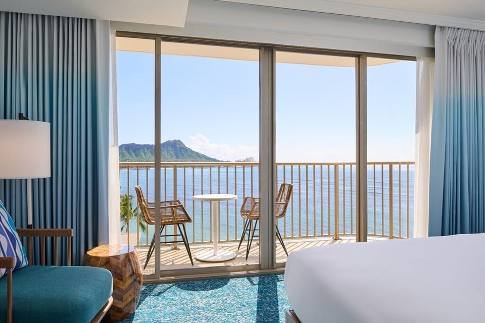 Sip sunset drinks on the balcony with panoramic coastline views.