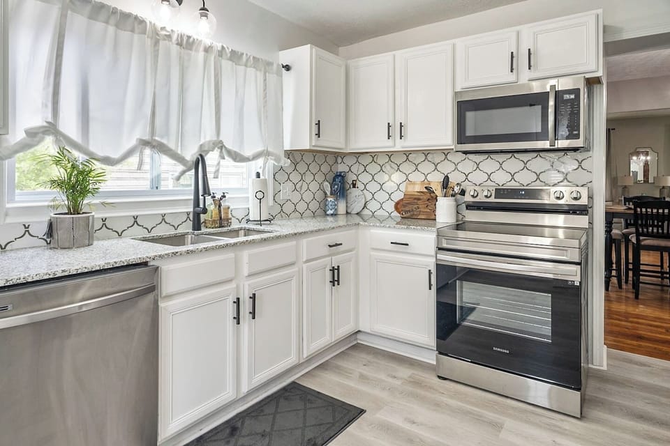 Unit 40: Our kitchen has everything you need to cook delicious meals. The appliances are top-of-the-line, the countertop is sleek and durable, and the kitchen is spacious and well-lit. This kitchen is perfect for entertaining guests or cooking for a 