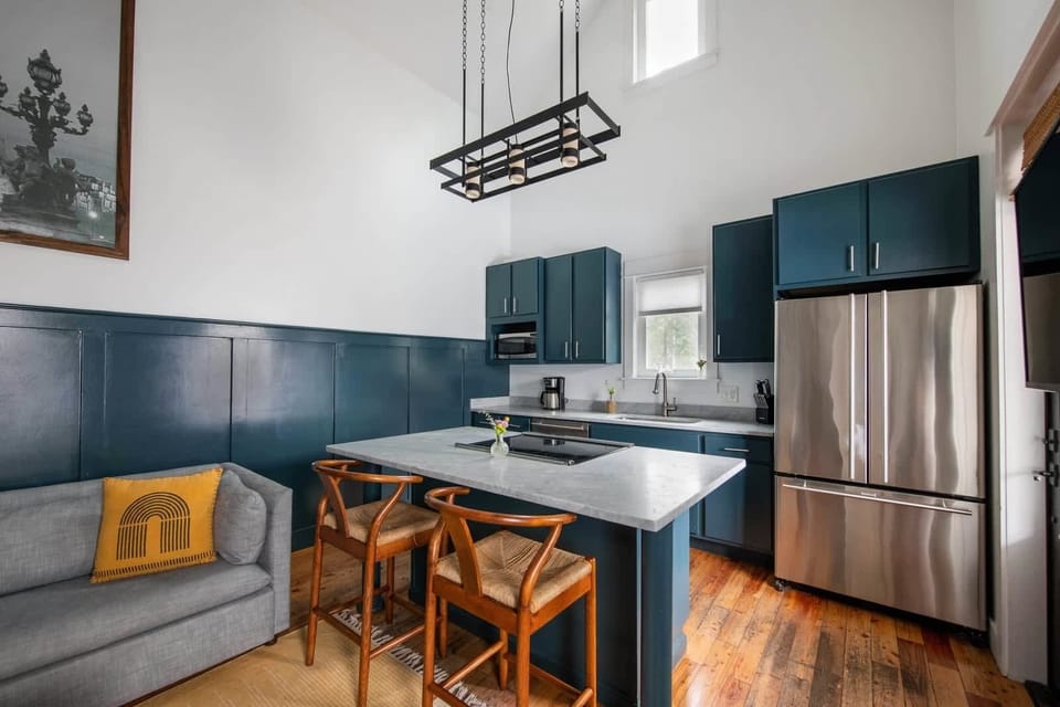 Fully equipped kitchen with everything you need to cook a meal and additional seating for four at the island!