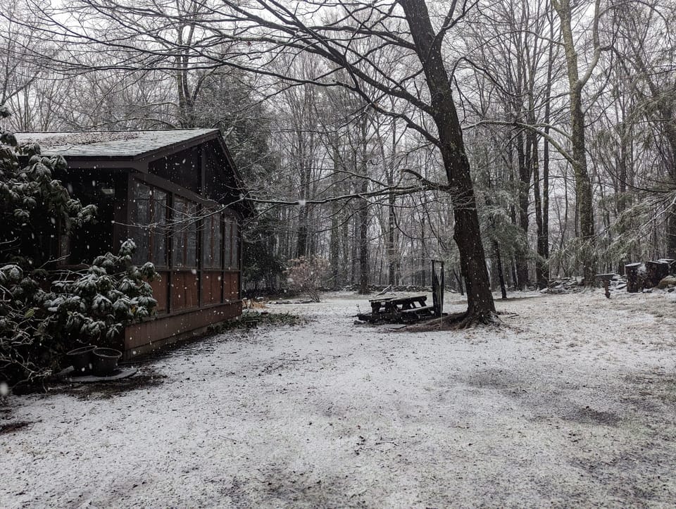 Porch and picnic table in snow