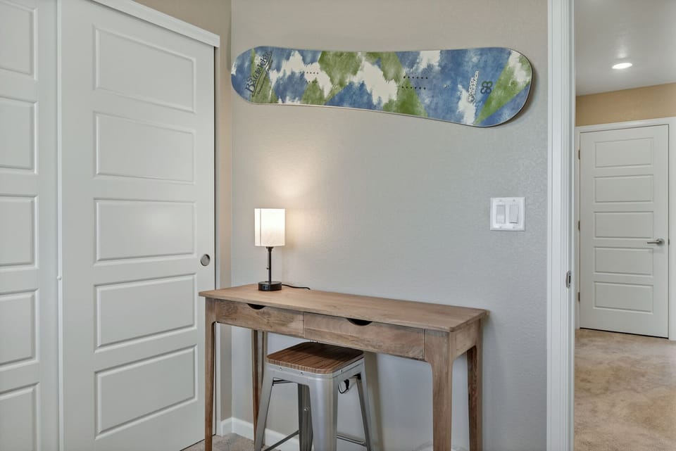 Dedicated workspace and wardrobe available at bedroom 5