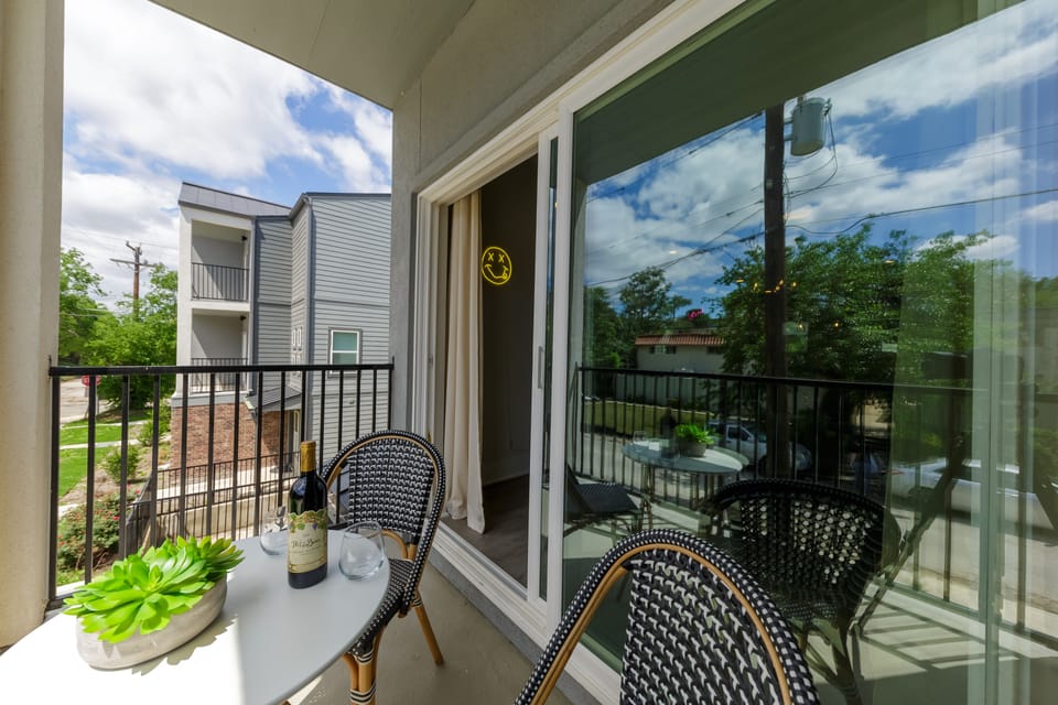 Relax and unwind on the patio off the living room with a beverage.
